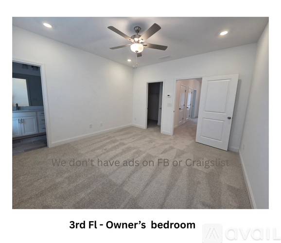 A bedroom with a ceiling fan and carpeted floor.