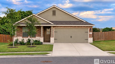 A house with a garage is available for sale.