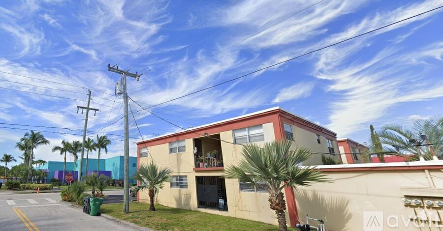 A building with a red roof and a sign that says "Sole" on it.