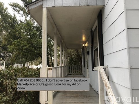 A porch of a house with a sign that reads "Call 704 268 9665. I don't advertise on facebook Marketplace or Craigslist, Look for my Ad on Zillow