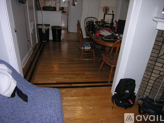 A room with a desk and a chair.