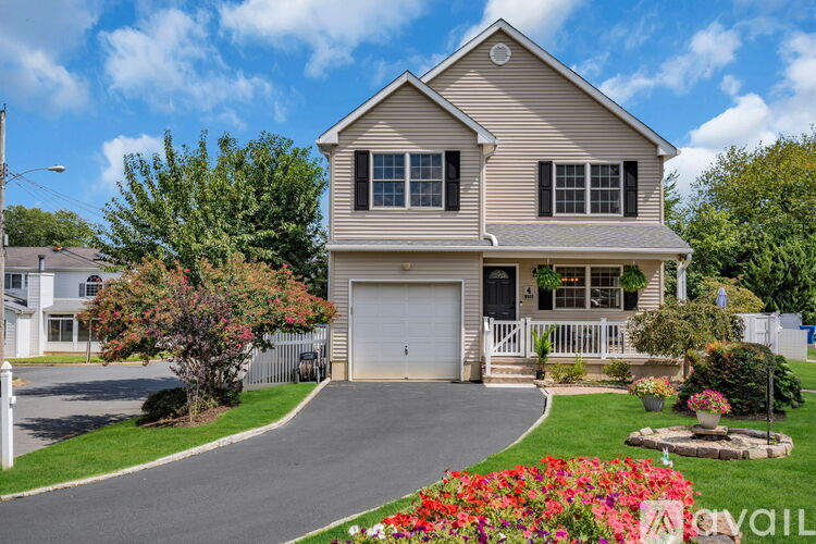 A house with a driveway and a garage.