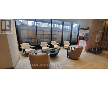 A room with a table and chairs in it.