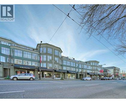A street view of a building with a sign that says REALTOR.