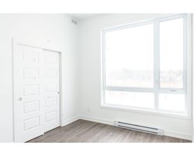A white door with a window above it.