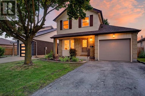 A house with a garage is shown in the image.