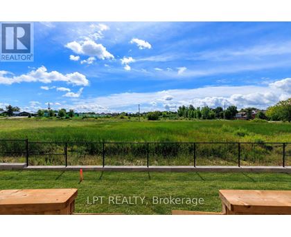 A fence with a sign that says LPT REALTY Brokerage.