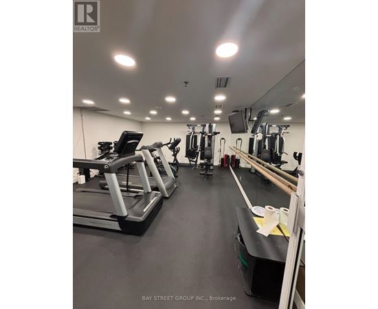 A gym with treadmills and exercise equipment.