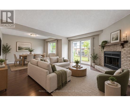A living room with a fireplace and a couch.