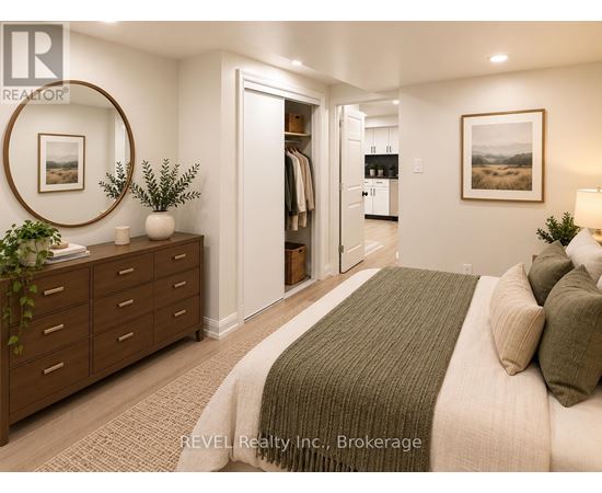 A bedroom with a large bed and a mirror on the wall.
