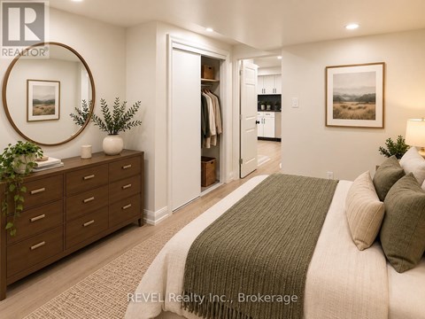 A bedroom with a large bed and a mirror on the wall.