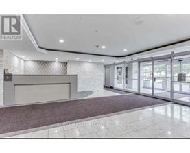 A reception area with a sign that says REALTOR.