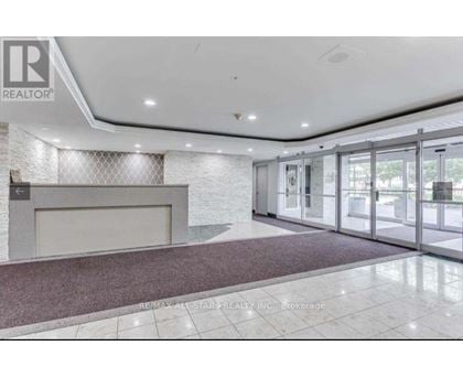 A reception area with a sign that says REALTOR.