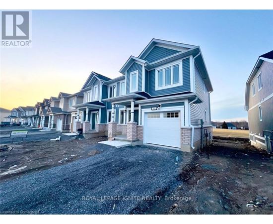 A row of houses with the first one being a two story house with a garage.