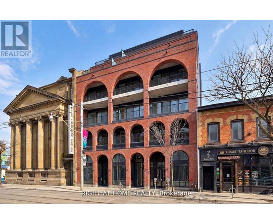 A building with a classical columned entrance and a red brick building with arched windows.