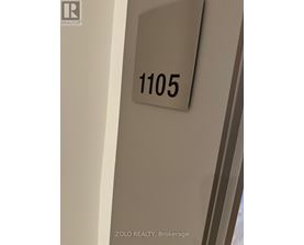 A sign with the number 1105 on it.