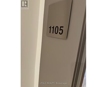 A sign with the number 1105 on it.