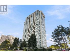 A tall residential building with balconies on the 10th floor and above.