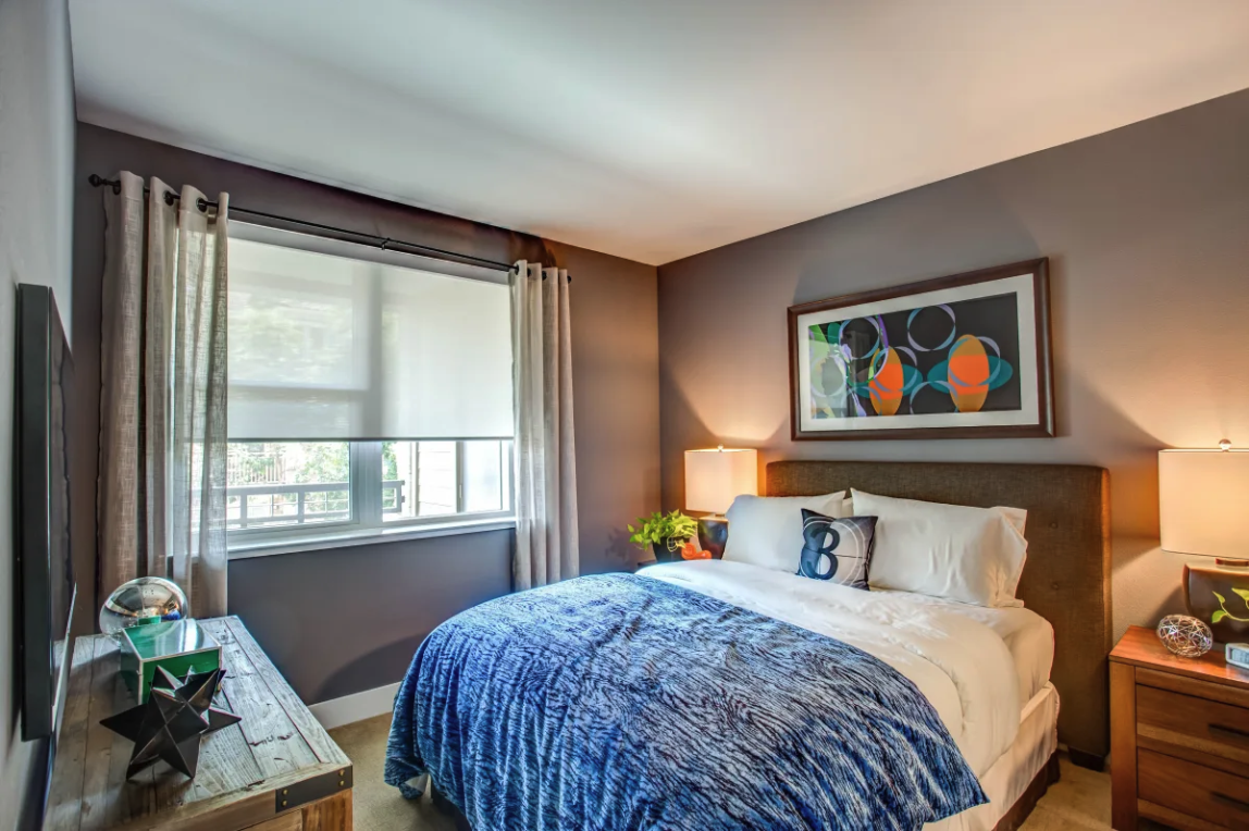Furnished bedroom with window