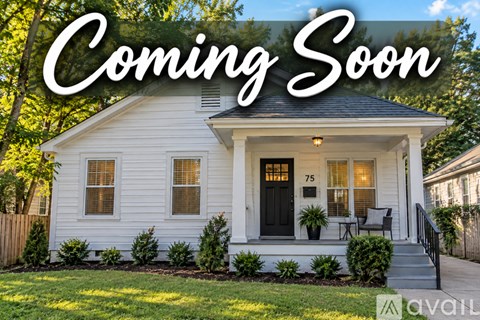 A house with the text "Coming Soon" in front of it.