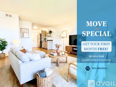 A living room with a couch, coffee table, and a plant with a sign offering a free first month of a service.