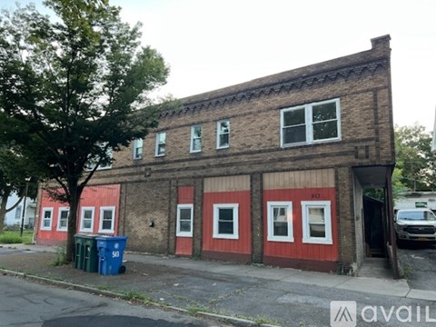 A red and brown building with the number 410 on it.