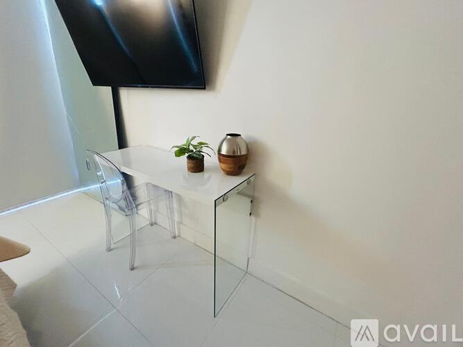 A small table with a plant on it.