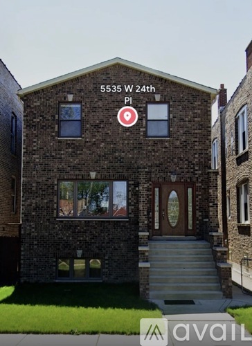A brick house with a sign that says 5535 W 24th.