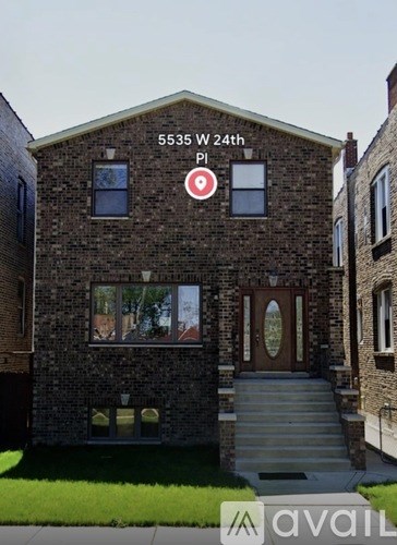 A brick house with a sign that says 5535 W 24th.