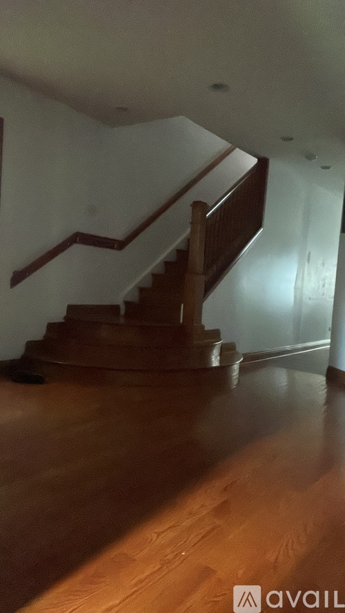 A wooden staircase in a house.