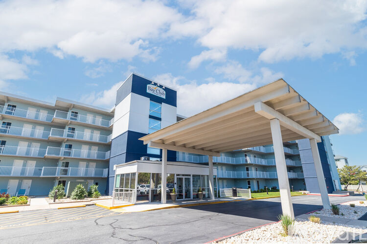 A large building with a blue and white sign that says "BayCare" on it.
