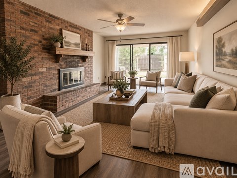 A living room with a fireplace and a couch.