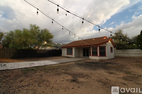 A house with a brown roof and a white wall is shown with a sign that says "available" in the foreground.