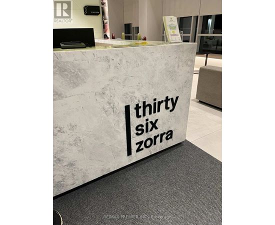 A reception desk with the words "thirty six zorra" on it.