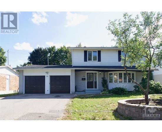 A two-story house with a garage is for sale.