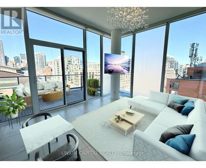 A modern living room with a large window overlooking the city.