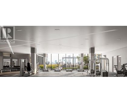 A gym with a row of treadmills and a row of exercise bikes.
