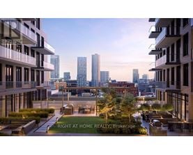A modern cityscape with buildings and a clear sky.