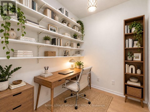 A room with a desk, chair, and shelves with plants and books.