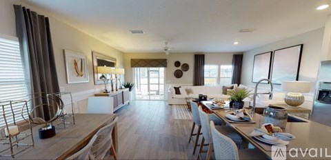A modern dining room with a wooden table and chairs.