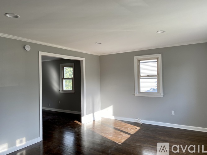A room with a door and a window.