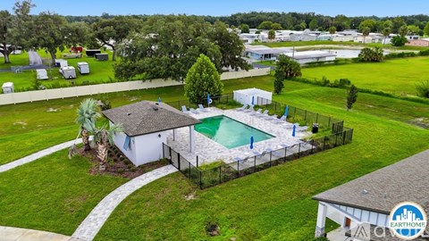 A house with a pool in the backyard.