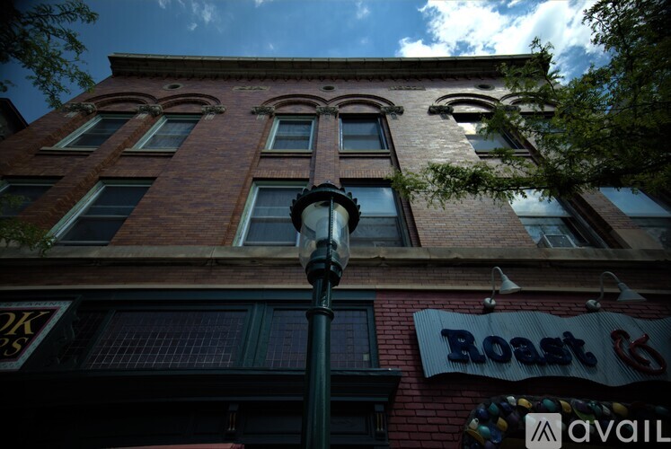 A building with a sign that says "Boast" on it.