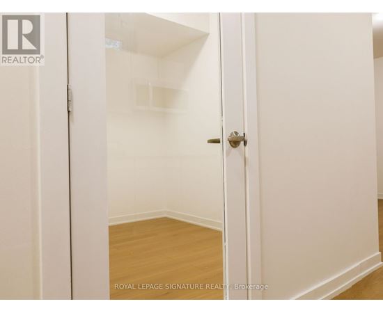 A white door with a Royal LePage Signature Realty logo on it.