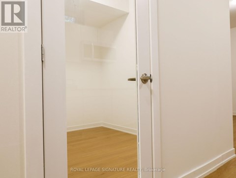 A white door with a Royal LePage Signature Realty logo on it.