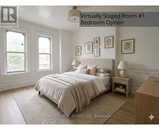 A bedroom with a large bed and a nightstand.