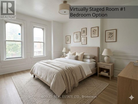 A bedroom with a large bed and a nightstand.