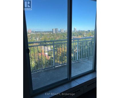 A view of a city from a balcony.