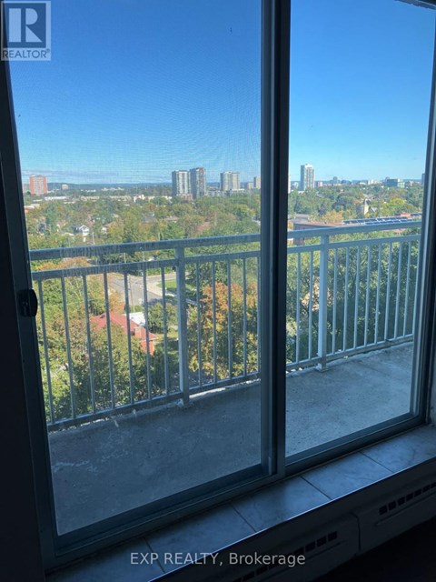 A view of a city from a balcony.