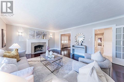 A living room with a fireplace and a couch.